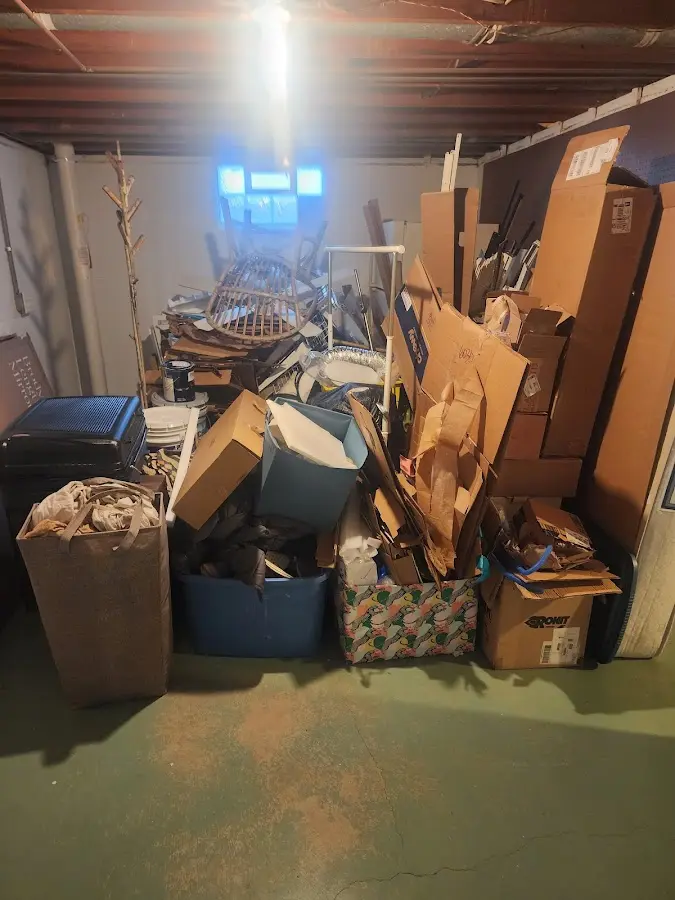 Roll-off dumpster container at job site for 20 Yard Dumpster Rental in Wellsville